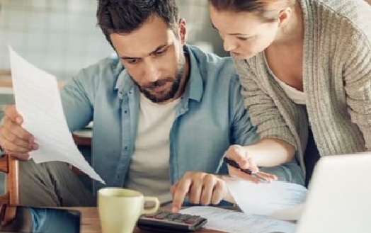 couple with bills