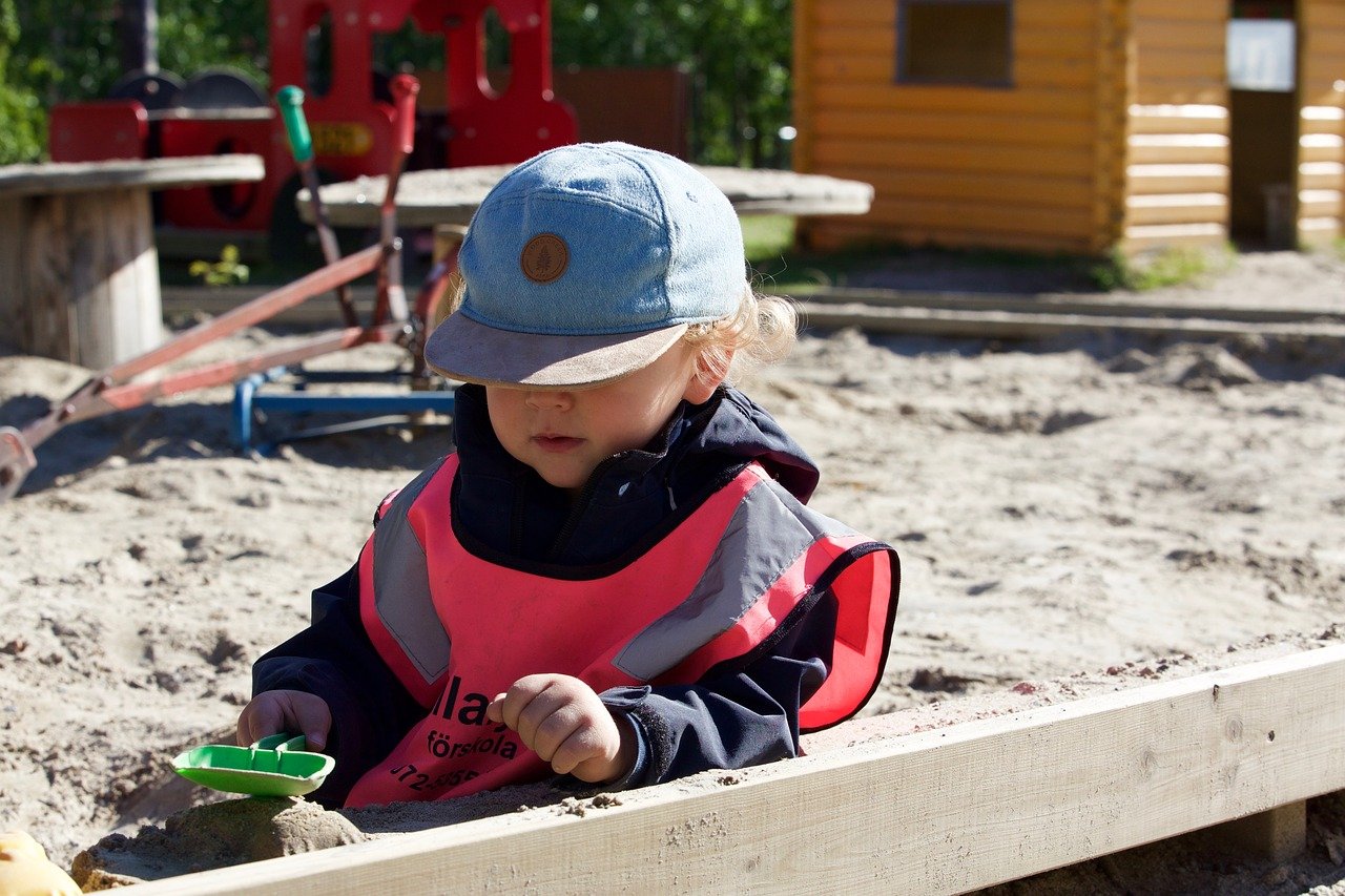 child in a sandpit