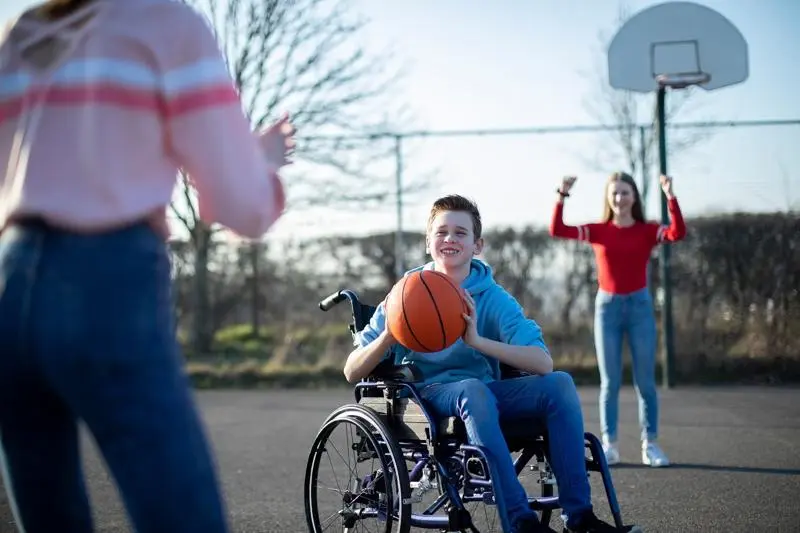 Youth playing basketball